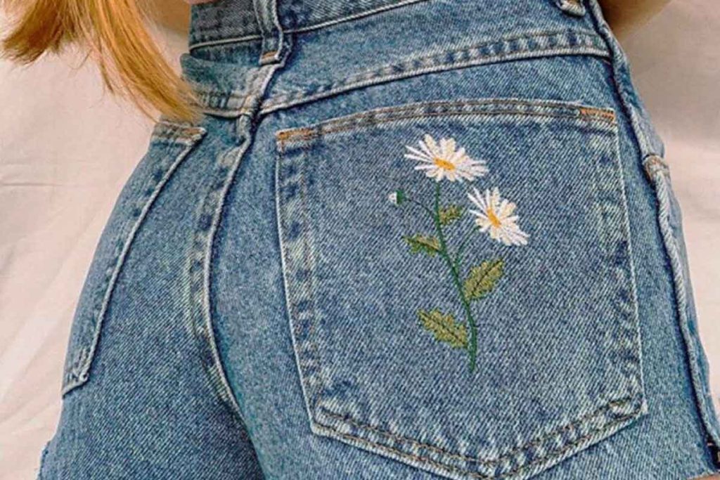 نحوه دوخت گل بابونه بر روی شلوار لی